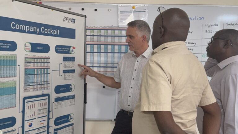 PN Uganda financial management training with a Swiss expert and Ugandan business leaders