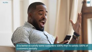 Entrepreneur reacting to a message on a smartphone, illustrating the importance of focused customer targeting